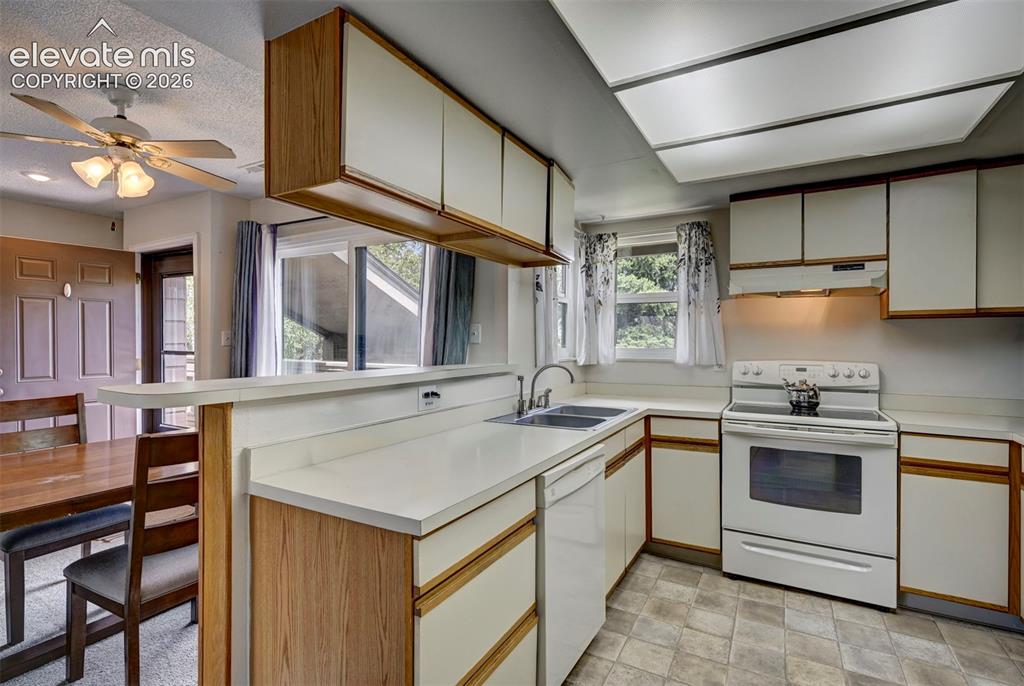 Image 9 of 25: The Kitchen overlooks and connects to dining and living areas. Ideal for ev