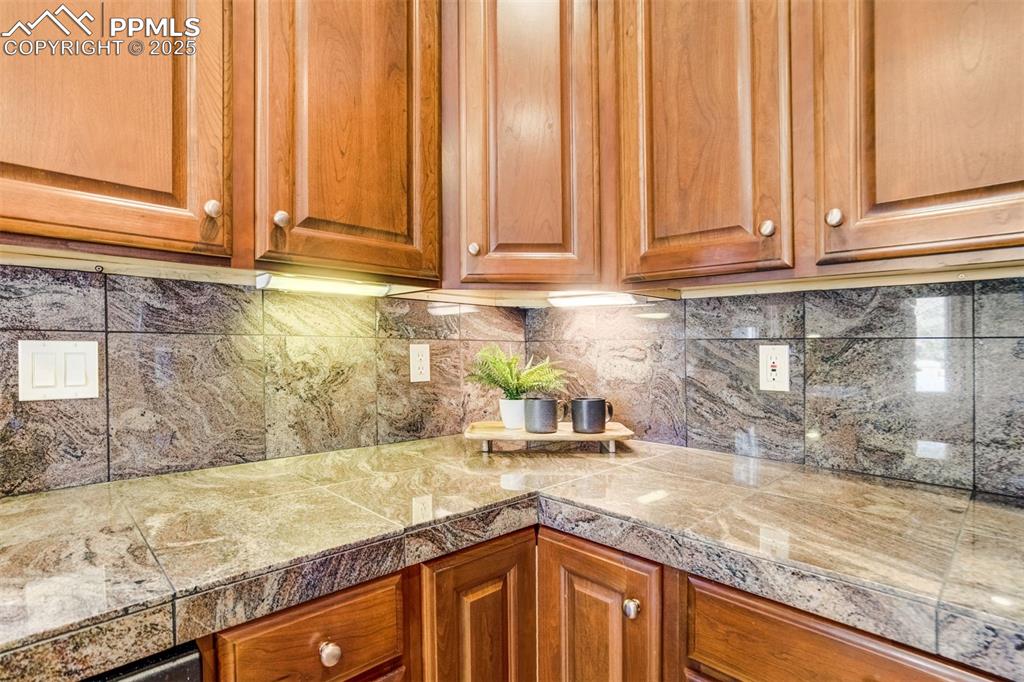 Image 13 of 49: Ample counter space and cabinet space.