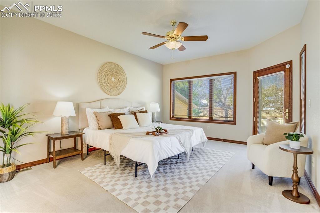 Image 19 of 49: Primary bedroom on the main level.