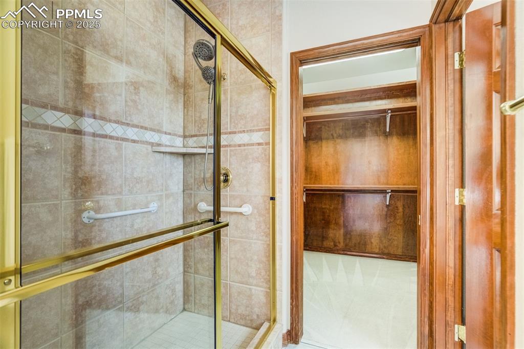 Image 24 of 49: Standing shower.