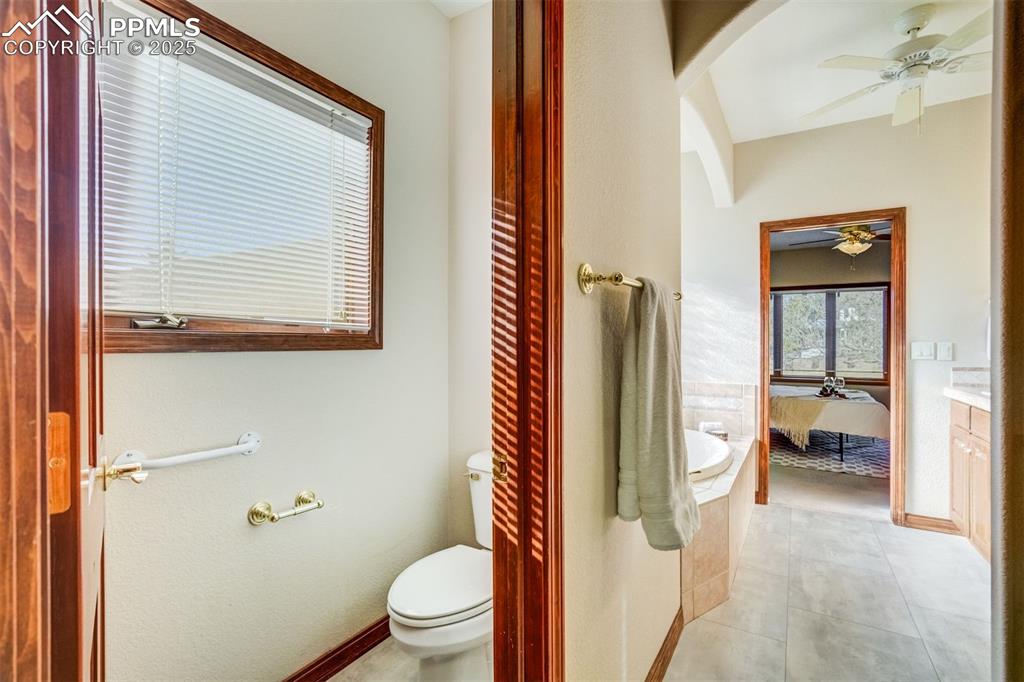 Image 25 of 49: Water closet with a window.