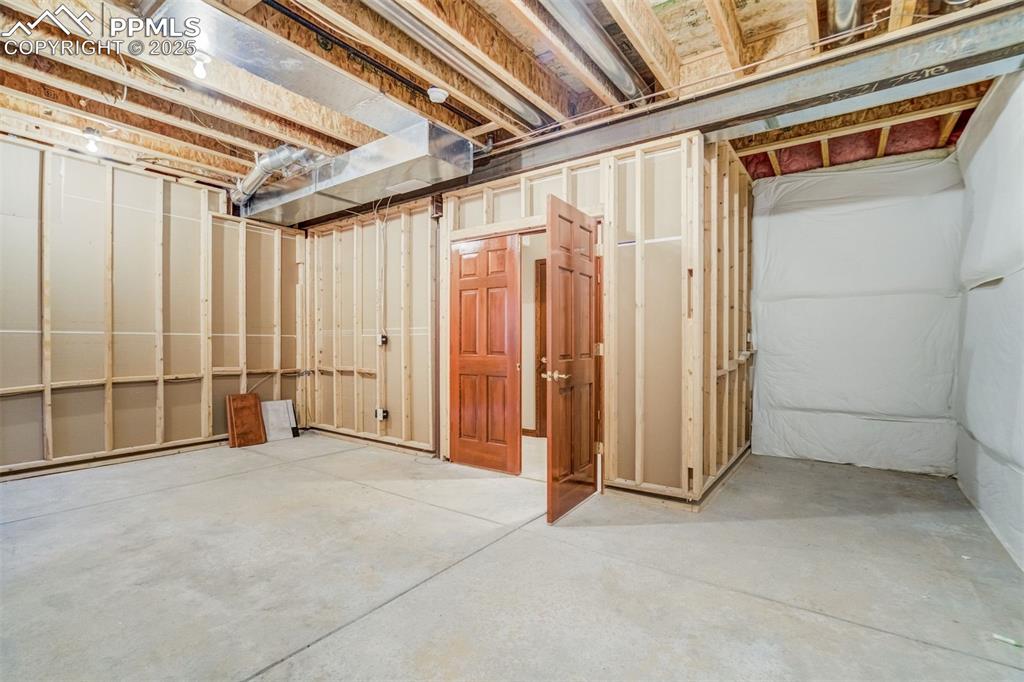 Image 42 of 49: Large unfinished space for those holiday decorations.