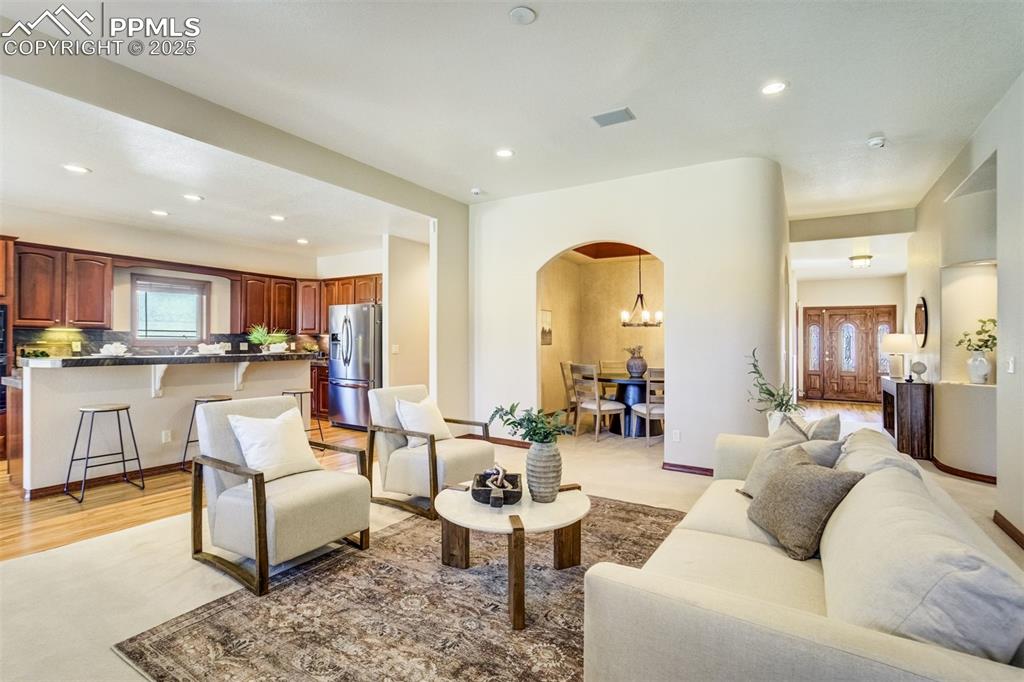 Image 7 of 49: Living room & kitchen are the center of the home.