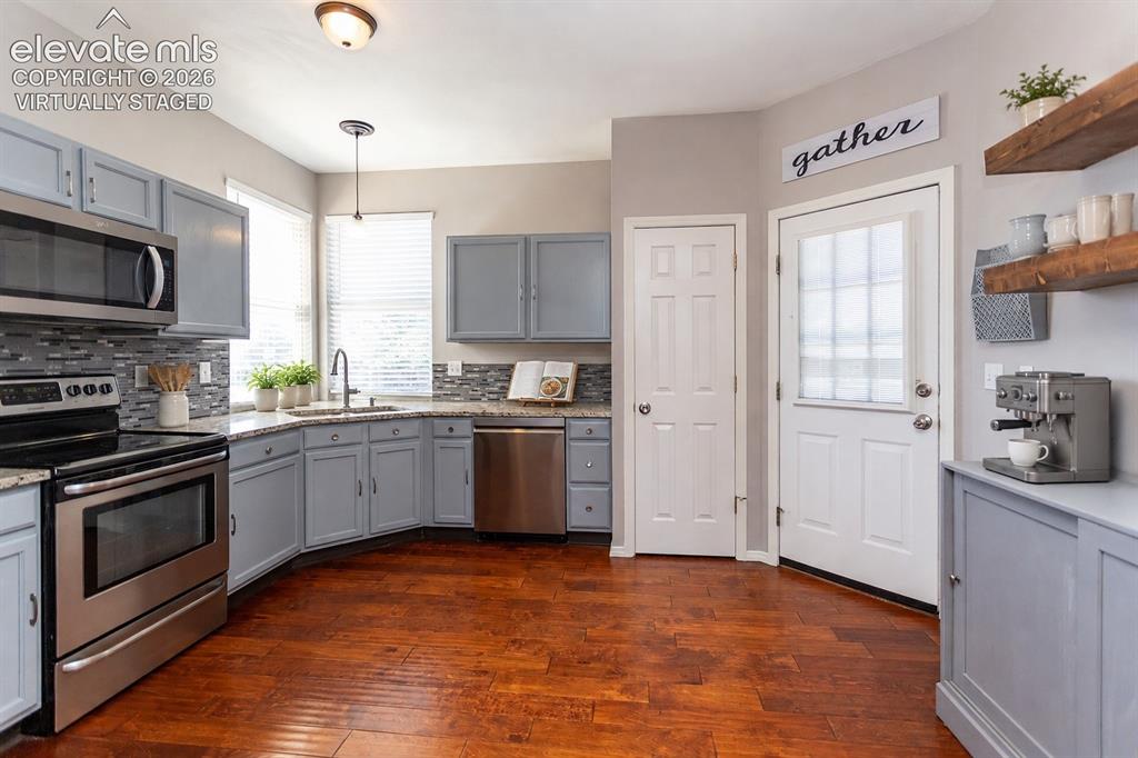 Image 16 of 50: Virtually staged kitchen