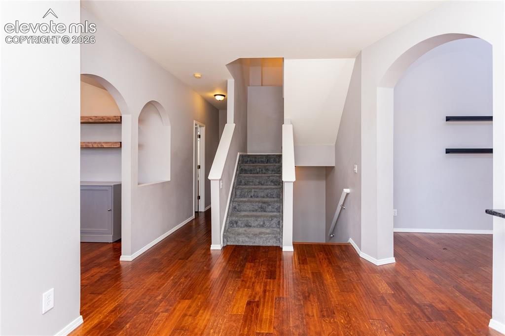 Image 19 of 50: Stairs going to 2nd floor