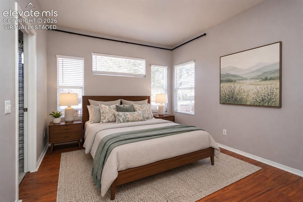 Image 22 of 50: Virtually staged primary bedroom