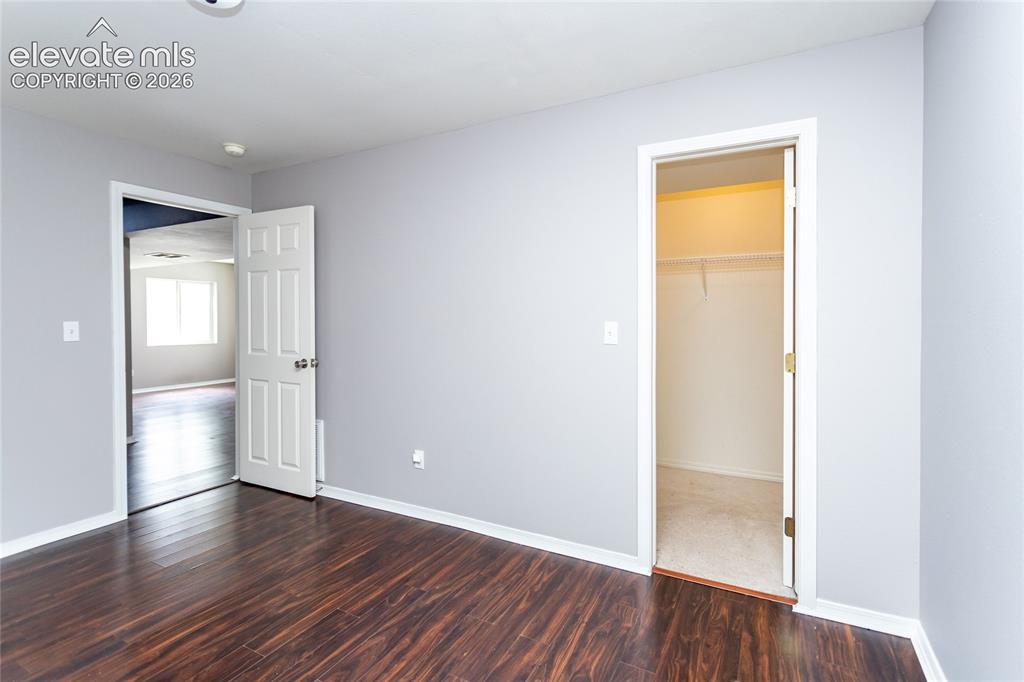 Image 42 of 50: Basment bedroom with walk-in closet
