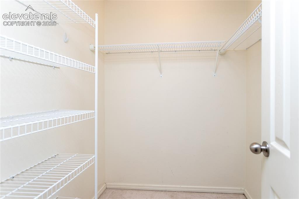 Image 43 of 50: Walk-in closet