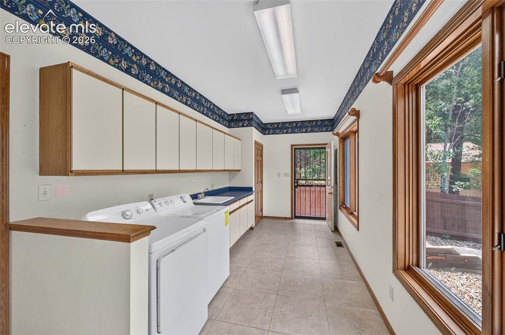 Image 14 of 50: Mud Room/Laundry Room with lots of storage