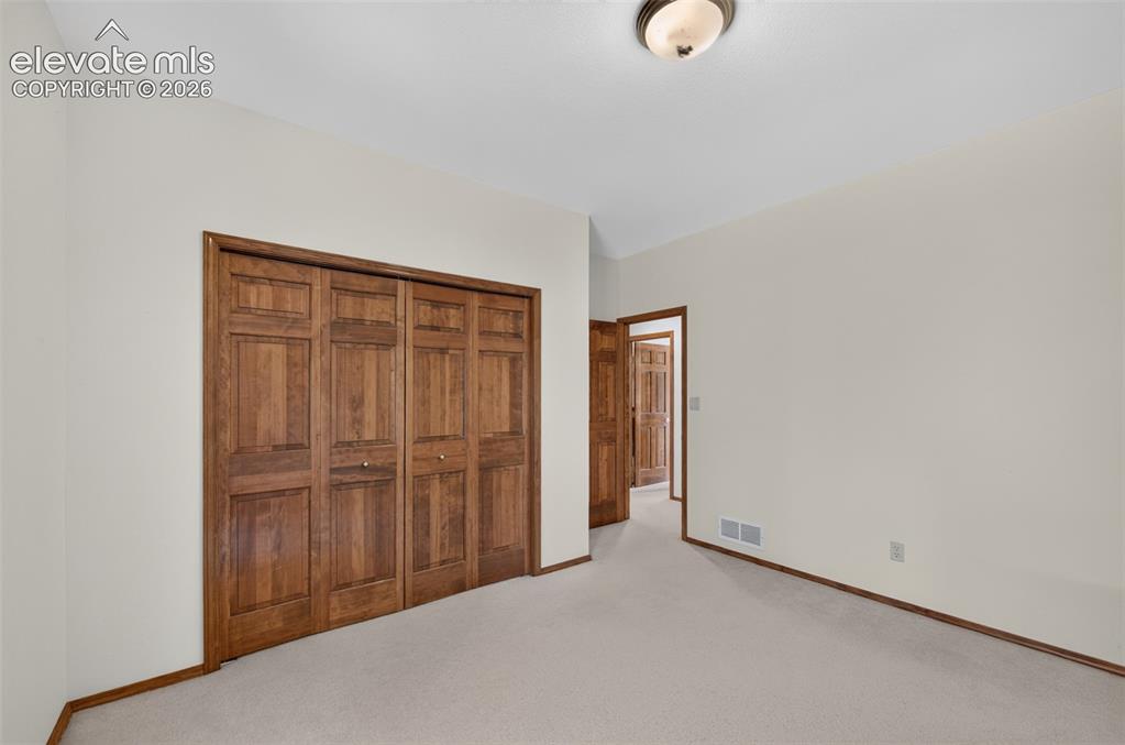 Image 19 of 50: Second Bedroom Main Level