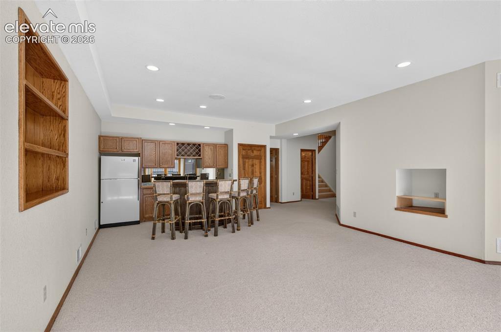 Image 22 of 50: Bar and Wet Bar Basement