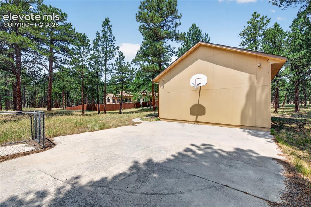 Image 43 of 50: Basketball Hoop on Detached Garage
