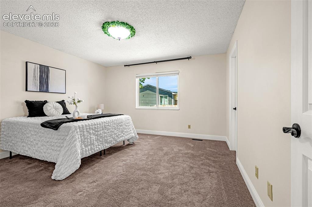 Image 19 of 49: Bedroom