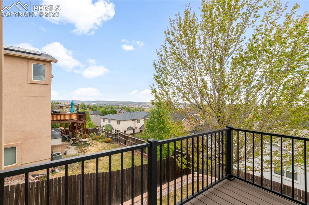 Image 10 of 35: Updated composite decking with views of downtown Colorado Springs
