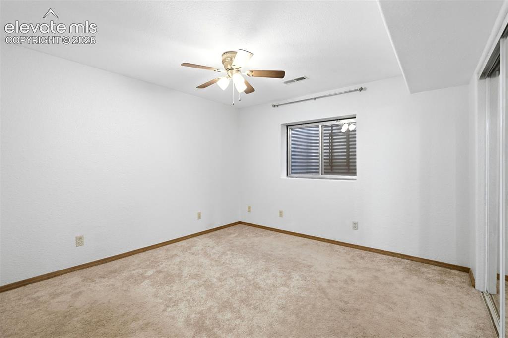 Image 25 of 32: basement bedroom