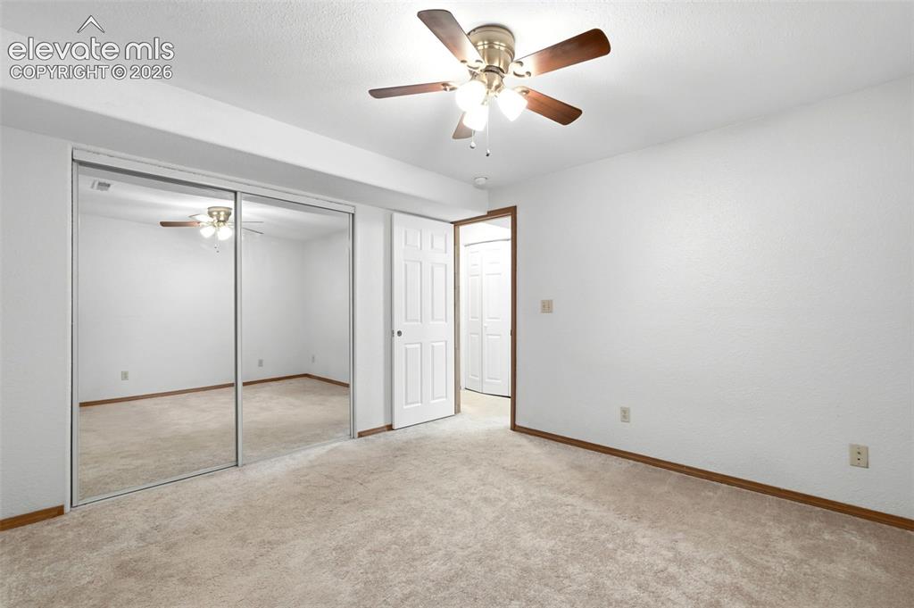 Image 26 of 32: basement bedroom