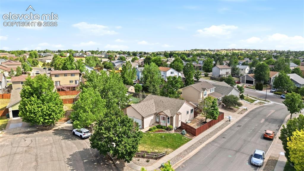 Image 27 of 32: Aerial perspective showcasing a residential neighborhood with diverse archi