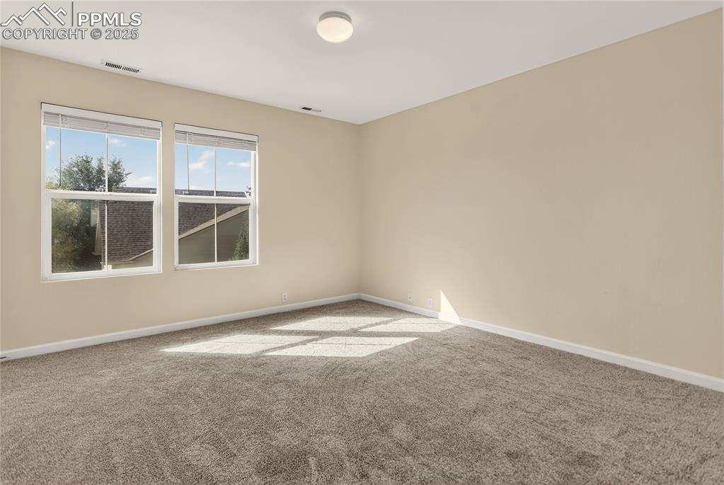 Image 14 of 25: Primary bedroom - upper level