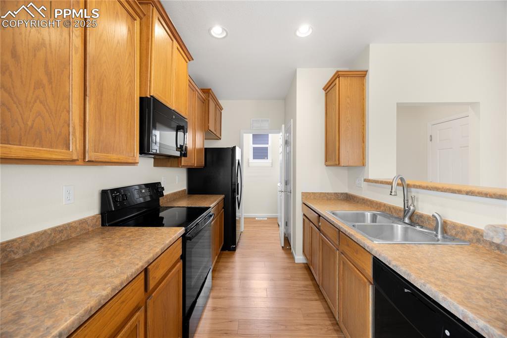 Image 7 of 25: Abundant cabinet storage