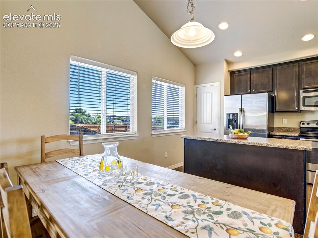 Image 16 of 39: Natural light makes this a bright, cheerful place to enjoy morning coffee 