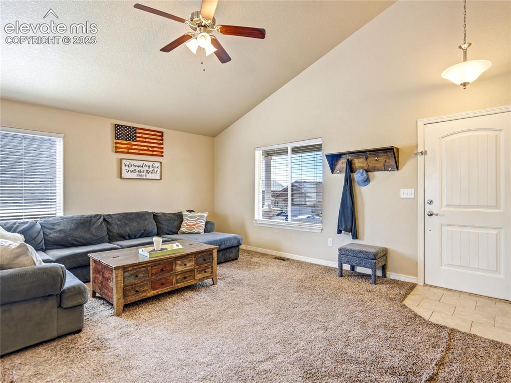 Image 9 of 39: Spacious main level living room gets great light all day long