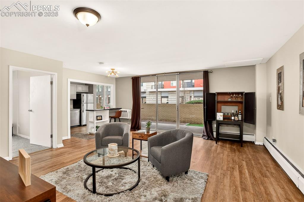 Image 2 of 25: Open Concept Living area with large sliding door