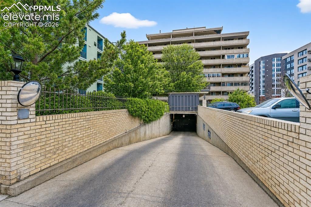 Image 21 of 25: Secured underground deeded parking space (enhanced photo)