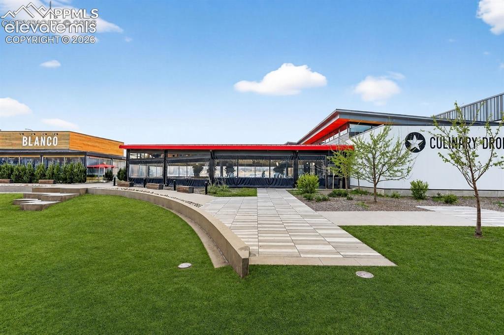 Image 25 of 25: Nearby area for pets to gather, adjacent to restaurants, 9th & CO. (enhance
