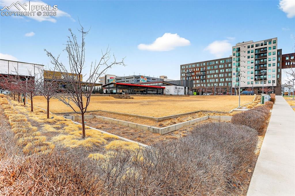 Image 26 of 26: Open space, shopping, restaurants, coffee and workout locations all walkabl