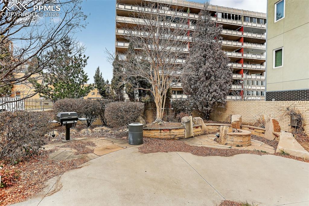 Image 4 of 26: View of Firepit, spa and private gathering area adjacent to pool