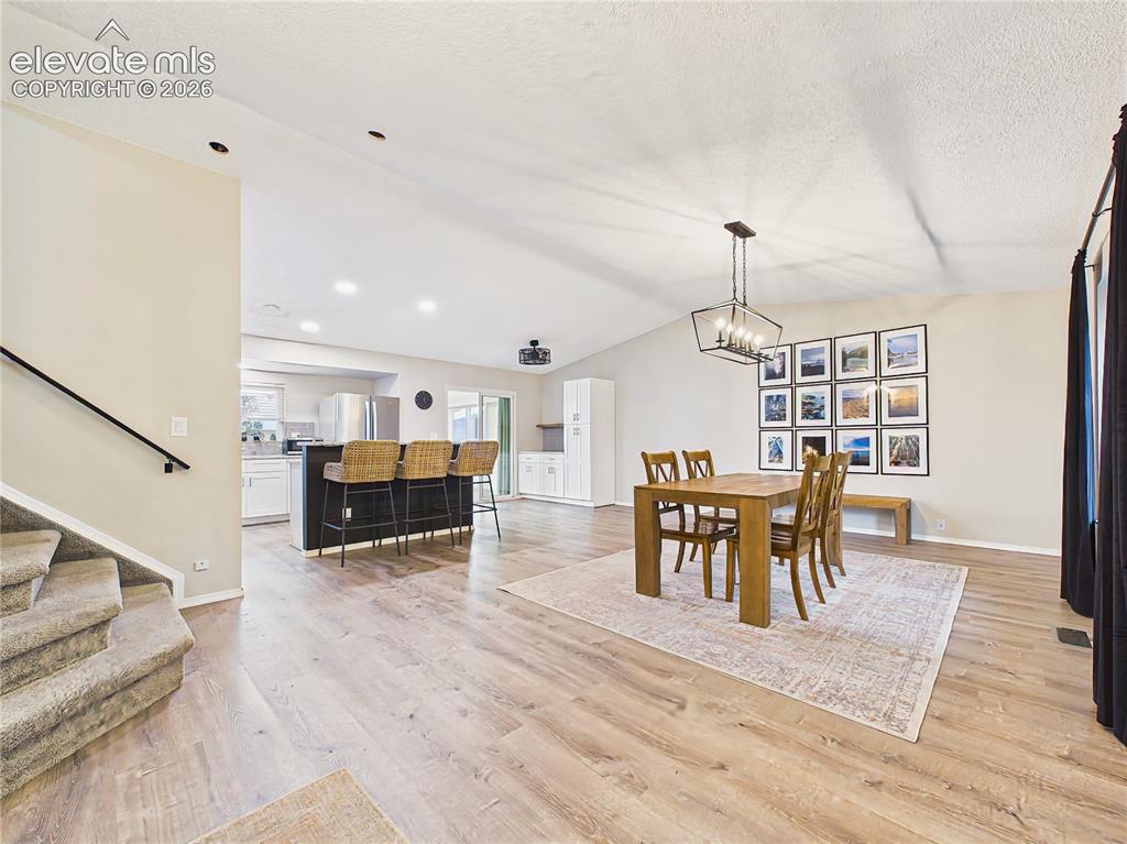 Image 5 of 50: Open-Concept Living & Dining – Bright, open main level offering seamless fl