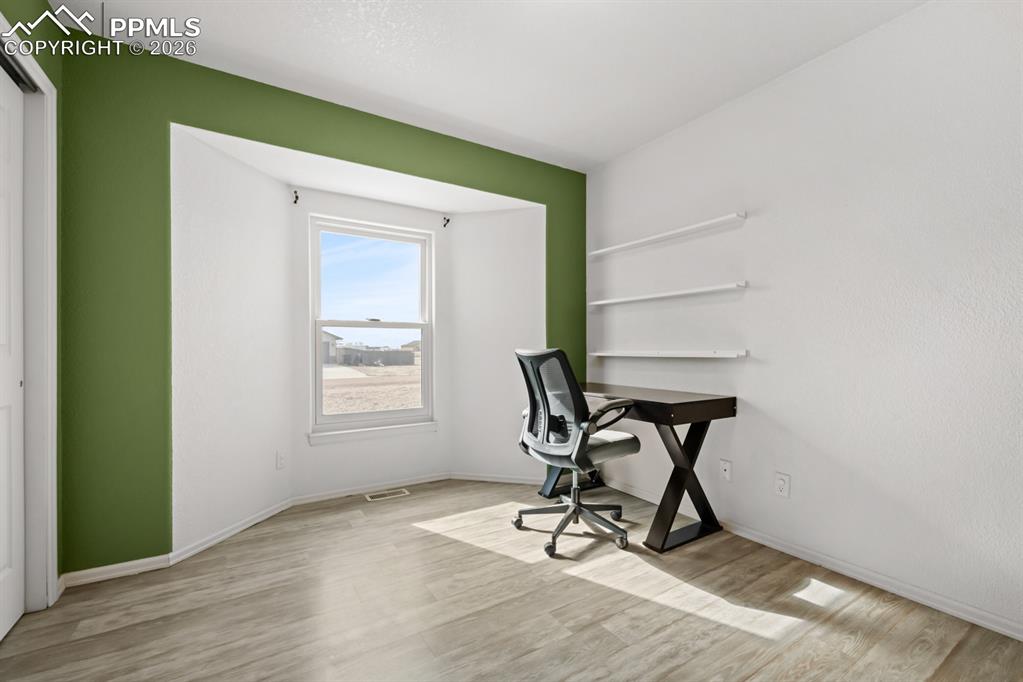 Image 14 of 38: Bedroom