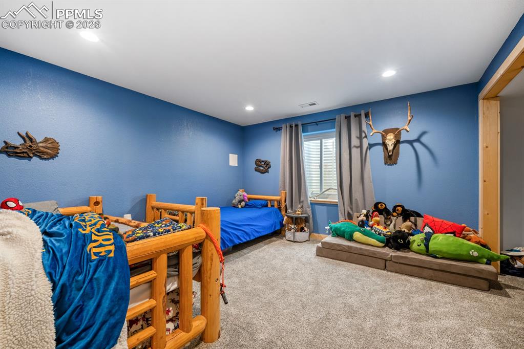 Image 23 of 38: Bedroom