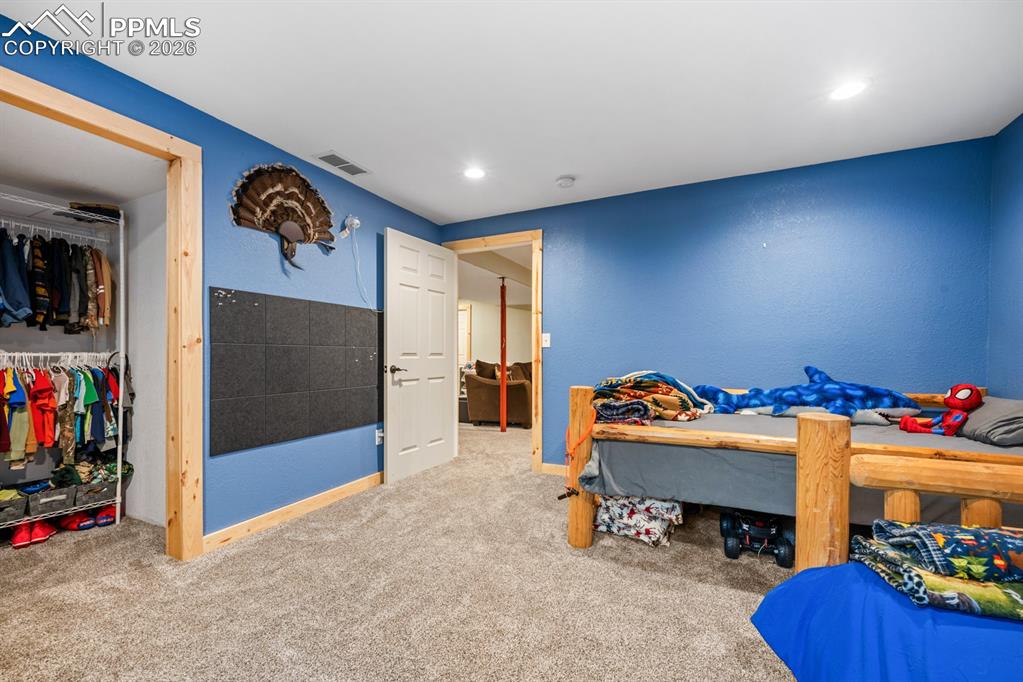 Image 24 of 38: Bedroom