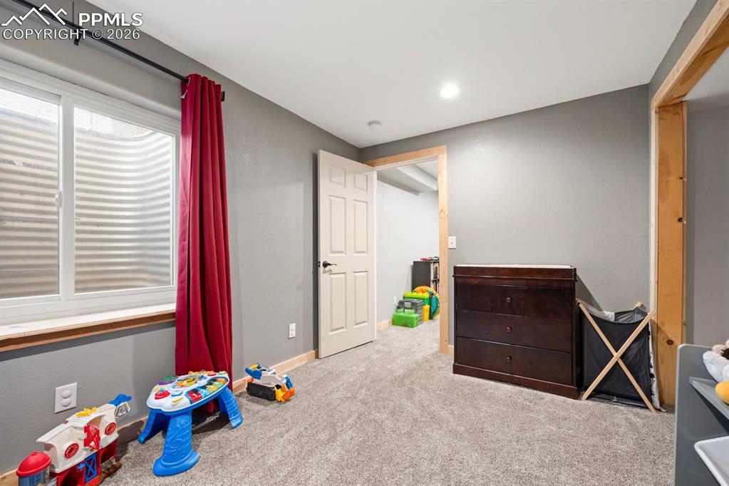 Image 26 of 38: Bedroom