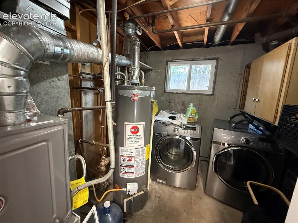 Image 26 of 30: Lower level laundry