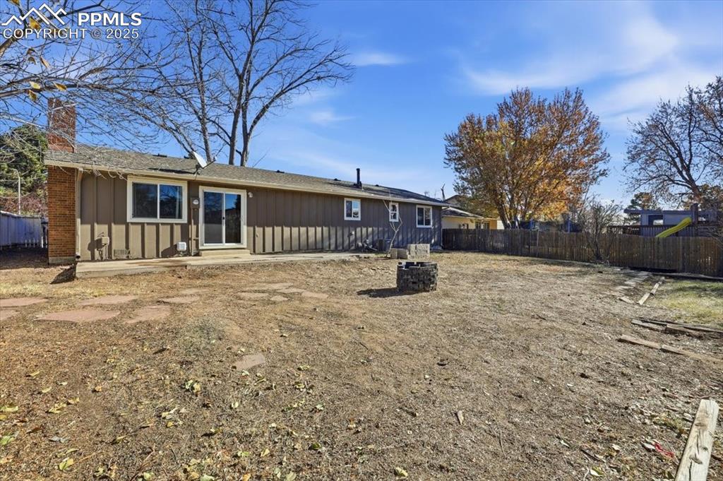 Image 43 of 48: Rear view of property large back yard