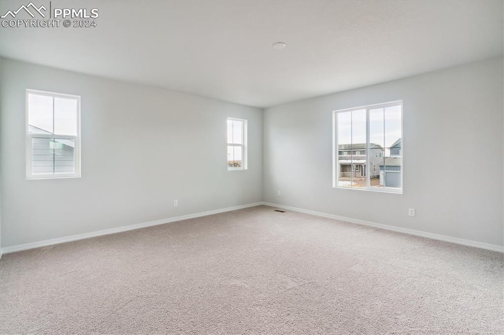 Image 16 of 23: Master Bedroom