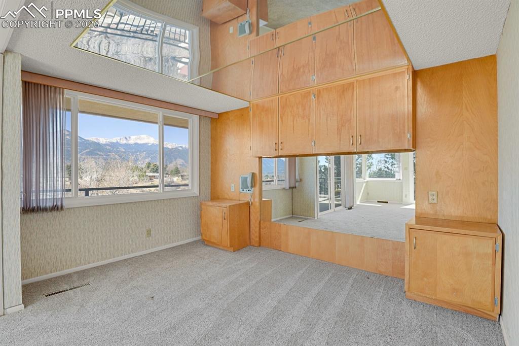 Image 22 of 49: Master Bedroom Mountain Views