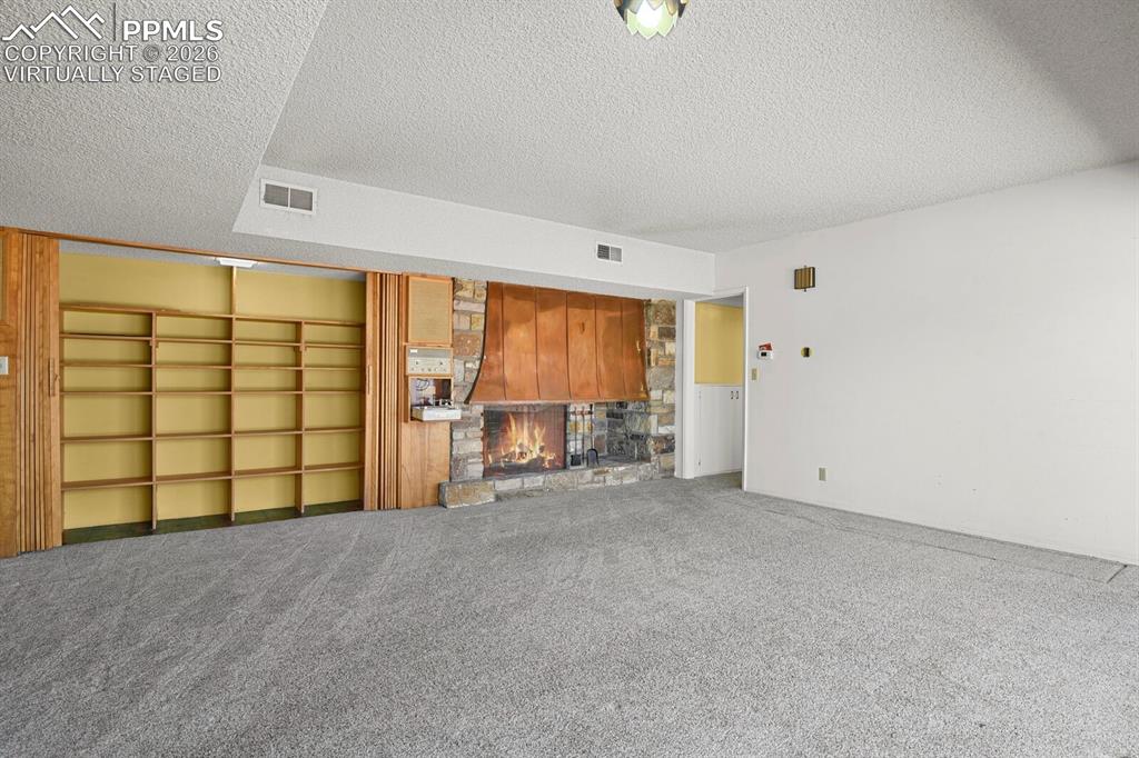 Image 31 of 49: *Active fire virtually staged