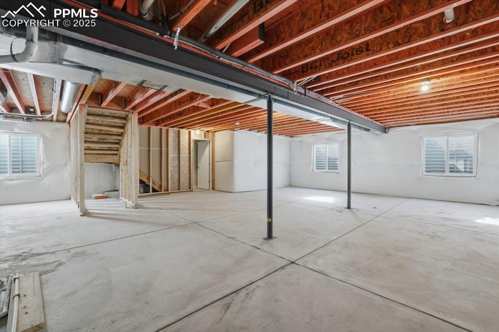 Image 29 of 34: Basement featuring stairway