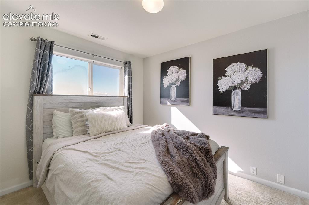 Image 24 of 36: Recessed window with a double pane, light-colored walls, and a ceiling-moun