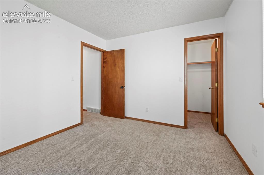 Image 12 of 21: Bedroom