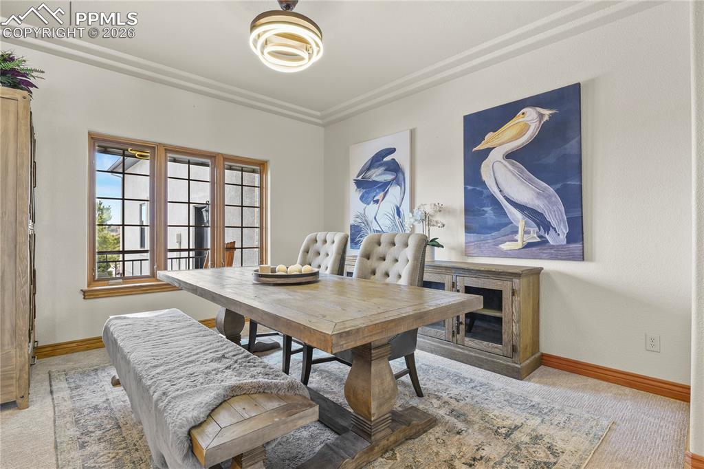 Image 12 of 50: Formal dining room for larger gatherings
