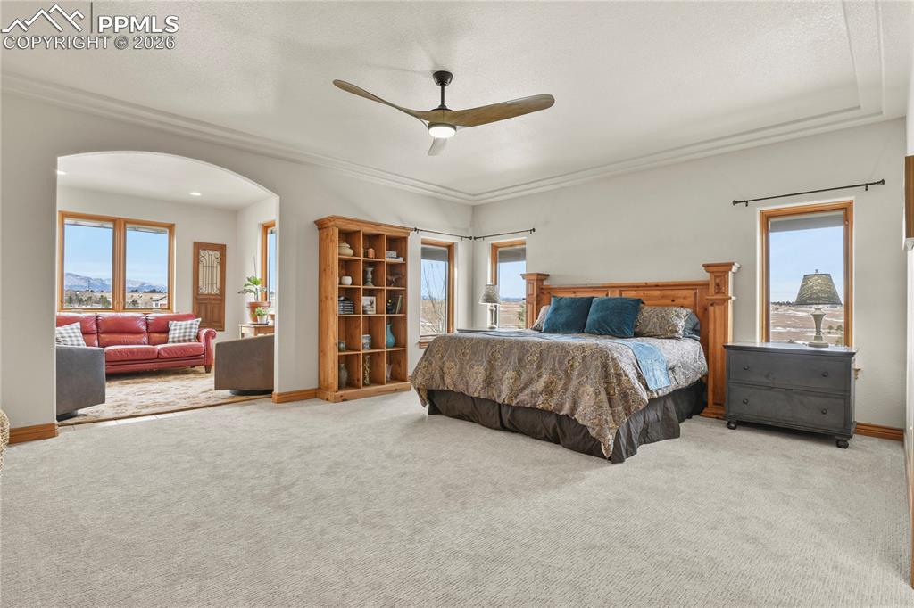 Image 15 of 50: Enormous main level primary suite with adjacent sitting room
