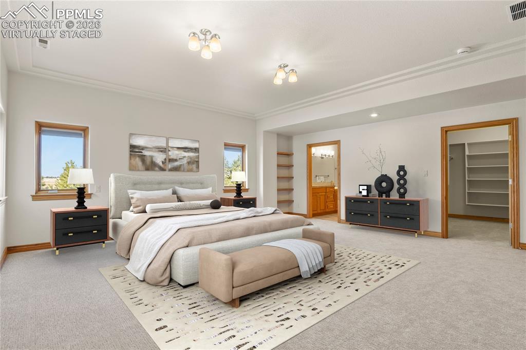 Image 28 of 50:  Lower Level Suite with large walk-in closet. Virtually Staged