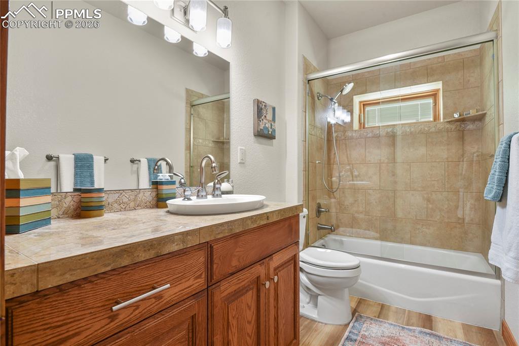 Image 32 of 50: Lower level hall bath