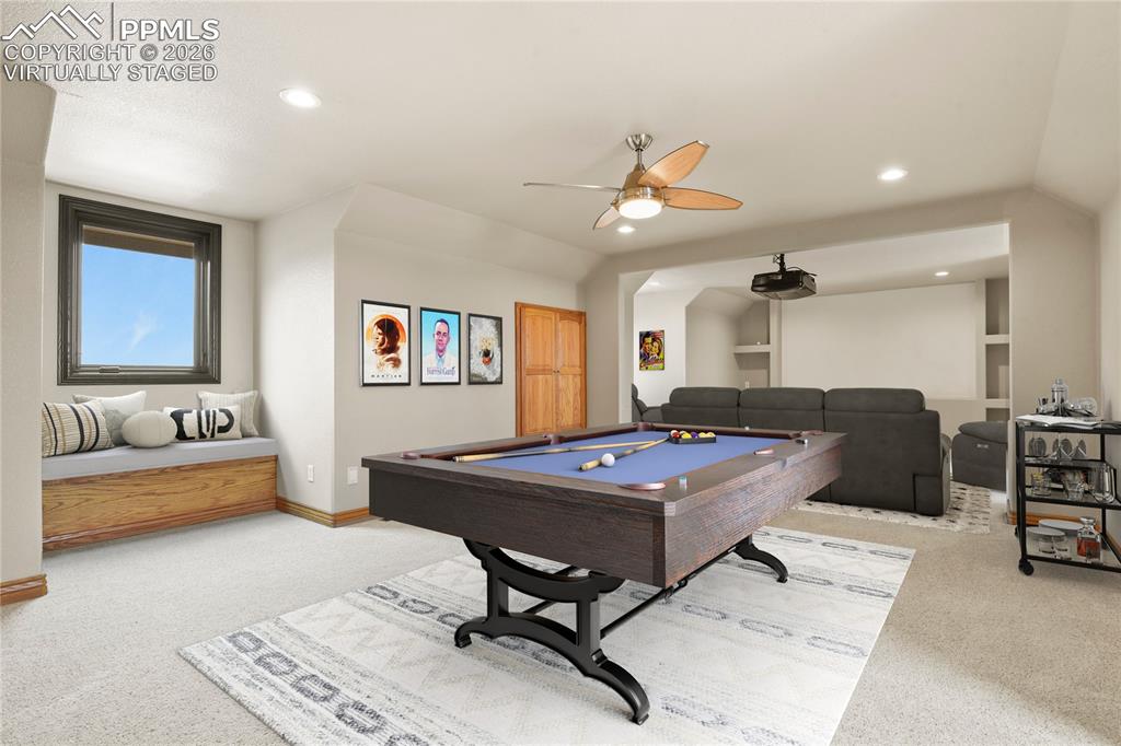 Image 35 of 50: Media/Bonus room complete with projector and equipment. Virtually Staged 