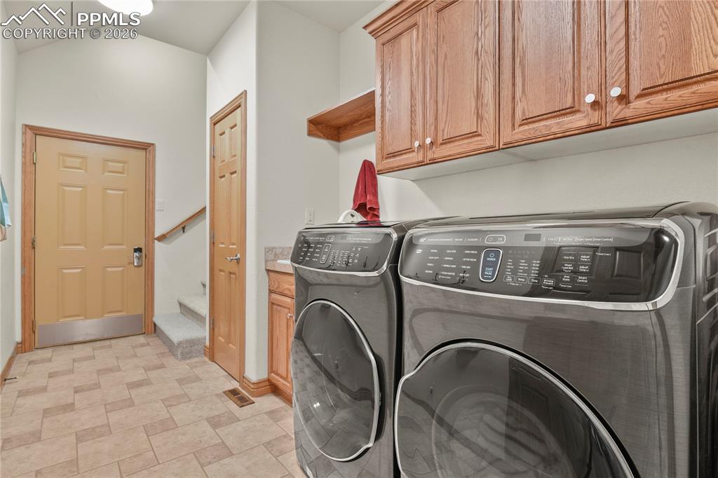 Image 37 of 50: Laundry room conveniently located on the main level