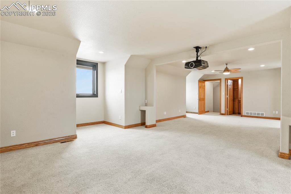 Image 43 of 50: Expansive Media/guest/hobby room over the 4 car garage